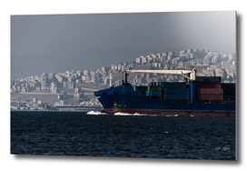 Boat full of containers on the sea in Izmir