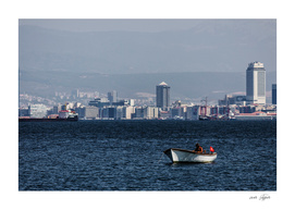 Lonely turkish fisherman on the sea of Izmir
