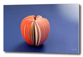 Fake Apple from paper on the purple violet background