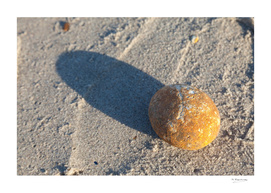 Stone and shadow at the beach