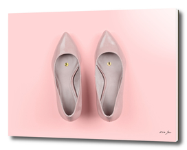 Pair of classic women's beige shoes with pushpin