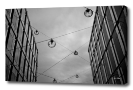 Glass Hanging Lamps Across Buildings