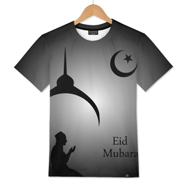 Man praying under the moon- Eid Mubarak
