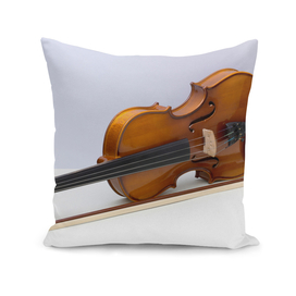 violin with bow over gray background