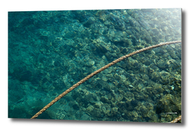 Rope over clear water