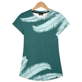 Palm leaves silhouettes on teal