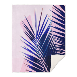 Indigo palm leaves on pastel pink geometry