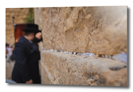 Religious orthodox jew praying at the Western Wall