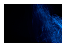 Glowing abstract curved blue lines