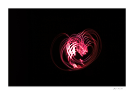 Heart shaped glowing abstract curved lines