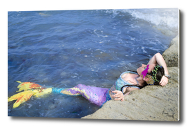 Rainbow Mermaid in the water