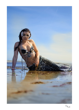 A mermaid on the beach