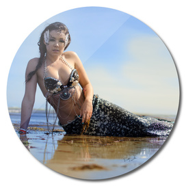 A mermaid on the beach