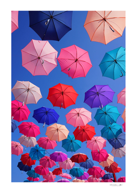 Colorful umbrellas with blue sky