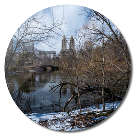 Bow Bridge and The San Remo of Central Park with snow