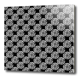 Linocut mandala pattern white on black