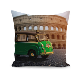 green car and Colosseum