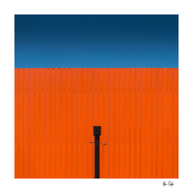Orange, complementary blue sky - one