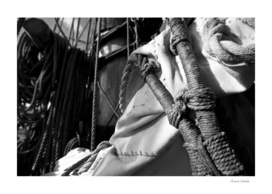 Reefed sail and hemp ropes