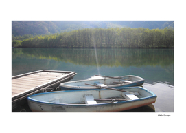 Boats On A Mountain Lake
