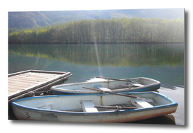 Boats On A Mountain Lake