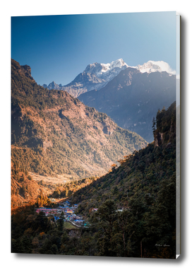 Himalayan town with Manaslu in the background