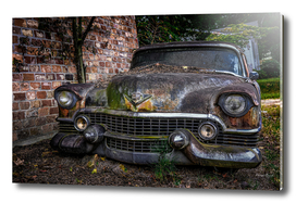 Old Caddy by Brick Wall
