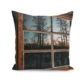 Grainy Sunset Reflection on Log Cabin Window