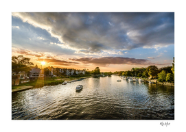 Scenic view of river against sky of Hampton Court