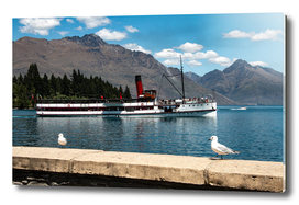 Queenstown waterfront with a steamship