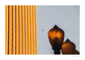 Urban Light with building and airplane at LACMA Los Angeles