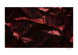 Background of crumpled red metal sheet
