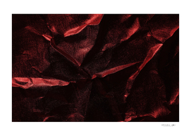 Background of crumpled red metal sheet