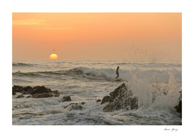 surfing sunset