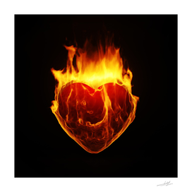 burning symbol heart on black