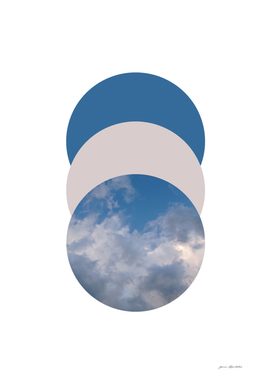Geometric circles collage blue sky and grey clouds