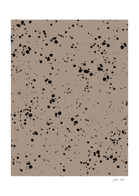 Black Paint Splatter on Dark Beige background