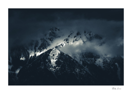 Darkness and clouds over the mountains