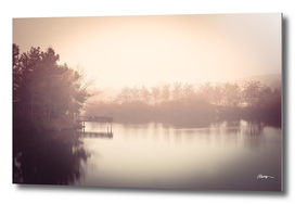 Autumn fog over lake