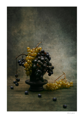 Still life with ripe grapes of different varieties