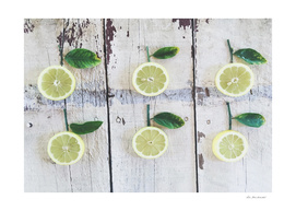 fresh and juicy lemon with green leaf on wooden table