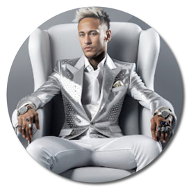 Araffe dressed in a silver suit sitting on a white chair,