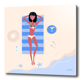 Bikini girl lying on beach : yellow sand and blue
