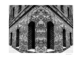 brick building in black and white