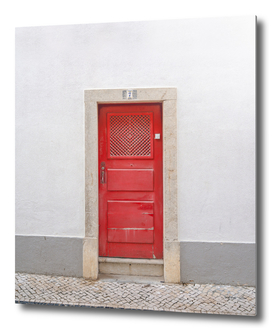The red door nr. 7 in Ericeira, Portugal -travel photography