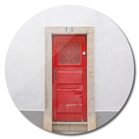 The red door nr. 7 in Ericeira, Portugal -travel photography