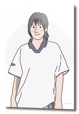 A woman wearing a retro football shirt