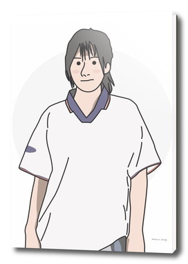 A woman wearing a retro football shirt
