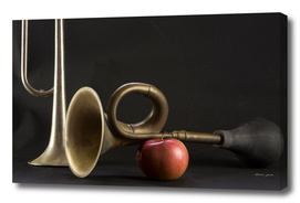 Two trumpets and an apple