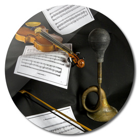 Violin, sheet music and trumpet